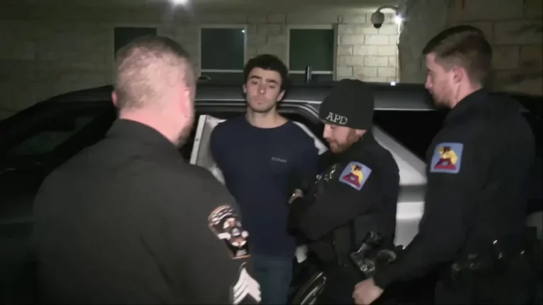 Luigi Mangione, 26, is escorted into a Pennsylvania courthouse, following questioning related to the murder of UnitedHealthcare CEO Brian Thompson.