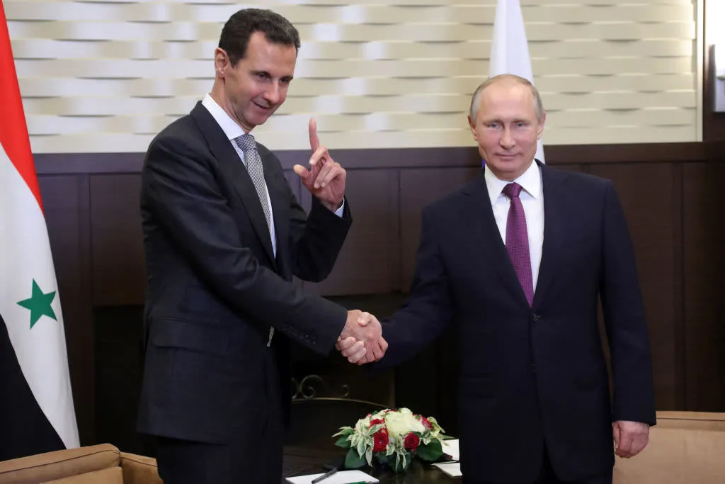 SikhoAI Basar Al Asad with Russian Pressident Putin