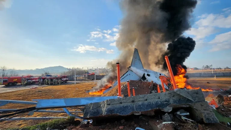 Firefighters conduct extinguishing operations on an aircraft that veered off the runway at Muan International Airport in Muan, South Jeolla Province, South Korea, on December 29, 2024. (Photo by Yonhap)