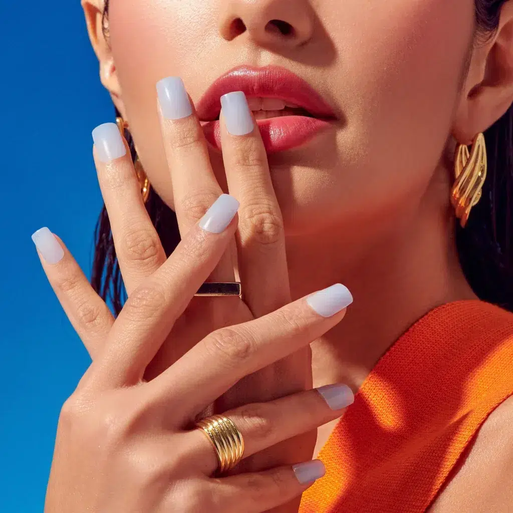 New Year Nails inspired by champagne's effervescent glow, featuring a gold velvet effect with a dimensional, textured finish, perfect for sophisticated celebrations