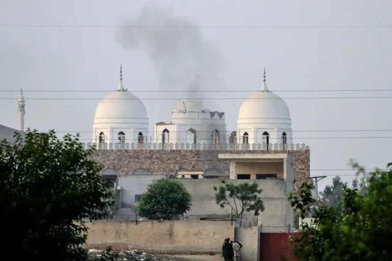 SikhoAI People outside a mosque damaged by an Indian missile strike, outskirts of Bahawalpur, Pakistan